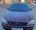 Красный Опель Астра, объемом двигателя 1.6 л и пробегом 268 тыс. км за 3500 $, фото 1 на Automoto.ua