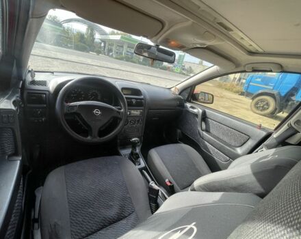 Красный Опель Астра, объемом двигателя 1.8 л и пробегом 300 тыс. км за 2200 $, фото 19 на Automoto.ua