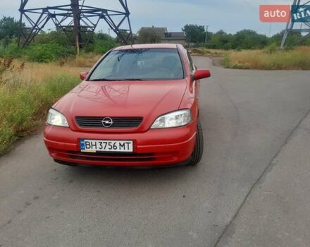 Красный Опель Астра, объемом двигателя 1.6 л и пробегом 147 тыс. км за 3600 $, фото 1 на Automoto.ua