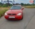 Красный Опель Астра, объемом двигателя 1.6 л и пробегом 147 тыс. км за 3600 $, фото 1 на Automoto.ua