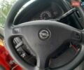 Красный Опель Астра, объемом двигателя 1.6 л и пробегом 147 тыс. км за 3600 $, фото 3 на Automoto.ua