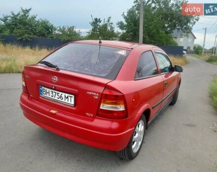 Красный Опель Астра, объемом двигателя 1.6 л и пробегом 147 тыс. км за 3600 $, фото 5 на Automoto.ua