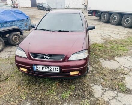 Красный Опель Астра, объемом двигателя 1.6 л и пробегом 270 тыс. км за 4000 $, фото 4 на Automoto.ua