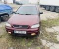 Красный Опель Астра, объемом двигателя 1.6 л и пробегом 270 тыс. км за 4000 $, фото 4 на Automoto.ua