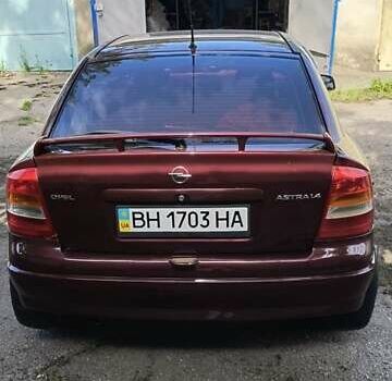 Красный Опель Астра, объемом двигателя 1.39 л и пробегом 210 тыс. км за 4400 $, фото 8 на Automoto.ua