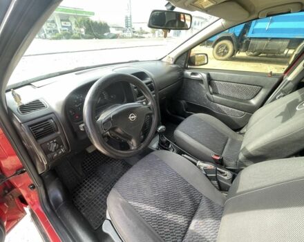Красный Опель Астра, объемом двигателя 1.8 л и пробегом 300 тыс. км за 2200 $, фото 14 на Automoto.ua