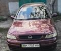 Красный Опель Астра, объемом двигателя 1.4 л и пробегом 210 тыс. км за 3600 $, фото 1 на Automoto.ua