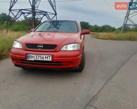 Красный Опель Астра, объемом двигателя 1.6 л и пробегом 147 тыс. км за 3600 $, фото 2 на Automoto.ua