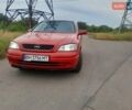 Красный Опель Астра, объемом двигателя 1.6 л и пробегом 147 тыс. км за 3600 $, фото 2 на Automoto.ua