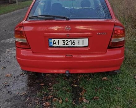 Красный Опель Астра, объемом двигателя 1.4 л и пробегом 264 тыс. км за 2700 $, фото 1 на Automoto.ua