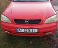Красный Опель Астра, объемом двигателя 1.4 л и пробегом 264 тыс. км за 2700 $, фото 3 на Automoto.ua