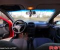 Червоний Опель Астра, об'ємом двигуна 1.4 л та пробігом 238 тис. км за 2999 $, фото 6 на Automoto.ua