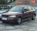 Червоний Опель Астра, об'ємом двигуна 1.6 л та пробігом 225 тис. км за 2900 $, фото 1 на Automoto.ua