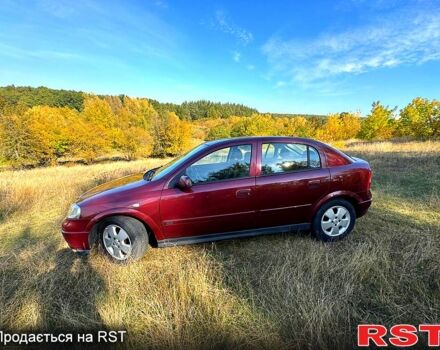 Красный Опель Астра, объемом двигателя 1.6 л и пробегом 149 тыс. км за 4000 $, фото 1 на Automoto.ua