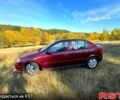 Красный Опель Астра, объемом двигателя 1.6 л и пробегом 149 тыс. км за 4000 $, фото 1 на Automoto.ua
