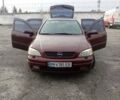 Червоний Опель Астра, об'ємом двигуна 1.6 л та пробігом 260 тис. км за 4000 $, фото 9 на Automoto.ua