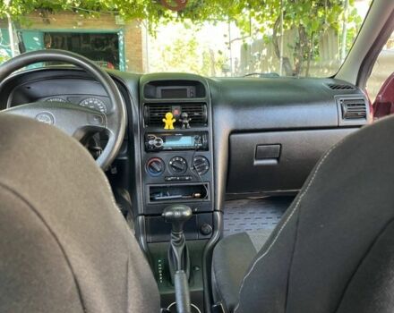 Червоний Опель Астра, об'ємом двигуна 1.6 л та пробігом 150 тис. км за 3800 $, фото 7 на Automoto.ua
