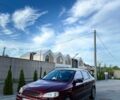 Красный Опель Астра, объемом двигателя 1.6 л и пробегом 243 тыс. км за 3600 $, фото 1 на Automoto.ua