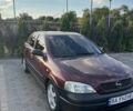Красный Опель Астра, объемом двигателя 1.6 л и пробегом 280 тыс. км за 2858 $, фото 1 на Automoto.ua