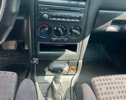 Красный Опель Астра, объемом двигателя 1.6 л и пробегом 300 тыс. км за 3500 $, фото 6 на Automoto.ua