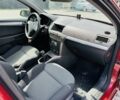 Красный Опель Астра, объемом двигателя 1.2 л и пробегом 210 тыс. км за 4500 $, фото 7 на Automoto.ua