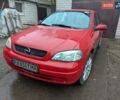 Красный Опель Астра, объемом двигателя 1.36 л и пробегом 207 тыс. км за 3500 $, фото 1 на Automoto.ua