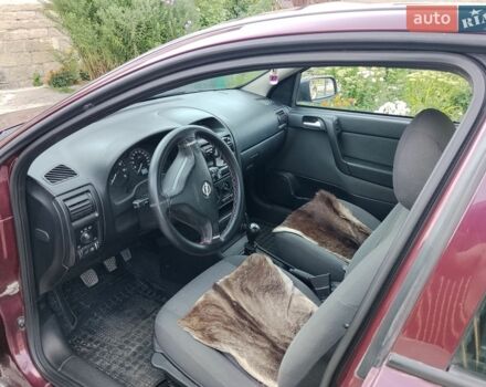 Красный Опель Астра, объемом двигателя 1.6 л и пробегом 235 тыс. км за 3950 $, фото 7 на Automoto.ua