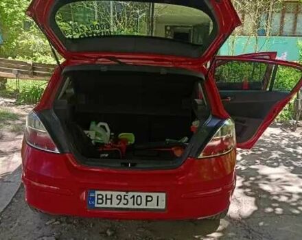 Красный Опель Астра, объемом двигателя 1.4 л и пробегом 186 тыс. км за 5500 $, фото 4 на Automoto.ua