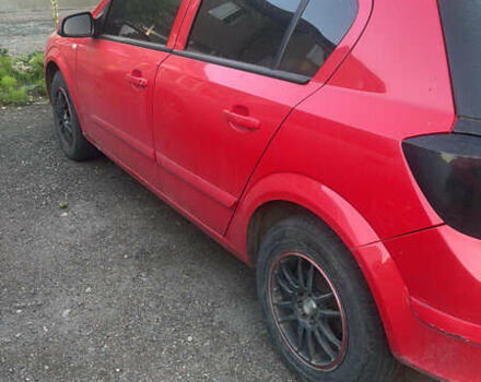 Красный Опель Астра, объемом двигателя 1.4 л и пробегом 200 тыс. км за 4000 $, фото 1 на Automoto.ua