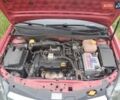 Красный Опель Астра, объемом двигателя 1.36 л и пробегом 192 тыс. км за 4500 $, фото 5 на Automoto.ua
