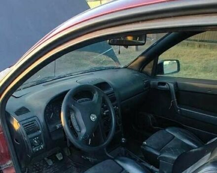 Красный Опель Астра, объемом двигателя 1.8 л и пробегом 150 тыс. км за 1201 $, фото 4 на Automoto.ua