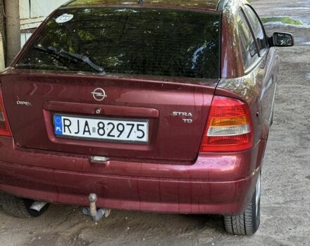 Красный Опель Астра, объемом двигателя 1.7 л и пробегом 350 тыс. км за 1600 $, фото 4 на Automoto.ua