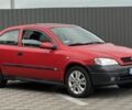 Красный Опель Астра, объемом двигателя 1.6 л и пробегом 324 тыс. км за 1500 $, фото 1 на Automoto.ua