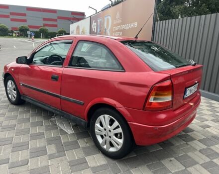 Красный Опель Астра, объемом двигателя 1.6 л и пробегом 324 тыс. км за 1500 $, фото 3 на Automoto.ua