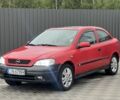 Красный Опель Астра, объемом двигателя 1.6 л и пробегом 324 тыс. км за 1500 $, фото 1 на Automoto.ua