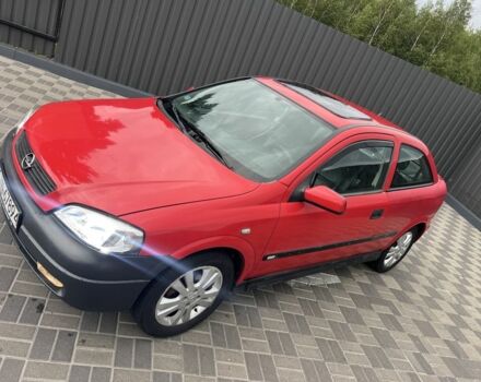 Красный Опель Астра, объемом двигателя 1.6 л и пробегом 324 тыс. км за 1500 $, фото 9 на Automoto.ua