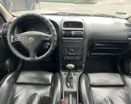 Красный Опель Астра, объемом двигателя 1.6 л и пробегом 324 тыс. км за 1500 $, фото 7 на Automoto.ua