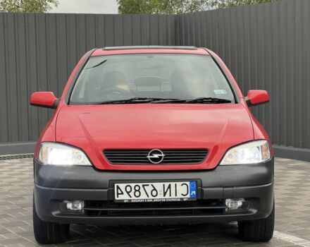 Красный Опель Астра, объемом двигателя 1.6 л и пробегом 324 тыс. км за 1500 $, фото 2 на Automoto.ua