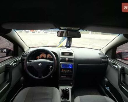 Красный Опель Астра, объемом двигателя 1.6 л и пробегом 220 тыс. км за 3300 $, фото 12 на Automoto.ua