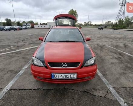 Красный Опель Астра, объемом двигателя 1.6 л и пробегом 220 тыс. км за 3300 $, фото 5 на Automoto.ua