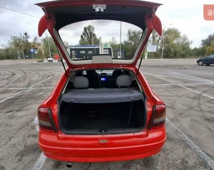 Красный Опель Астра, объемом двигателя 1.6 л и пробегом 220 тыс. км за 3300 $, фото 2 на Automoto.ua