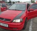 Красный Опель Астра, объемом двигателя 1.6 л и пробегом 220 тыс. км за 3300 $, фото 1 на Automoto.ua
