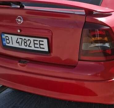 Красный Опель Астра, объемом двигателя 1.6 л и пробегом 220 тыс. км за 3300 $, фото 21 на Automoto.ua