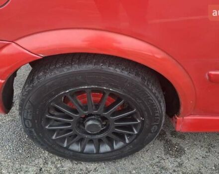 Красный Опель Астра, объемом двигателя 1.6 л и пробегом 220 тыс. км за 3300 $, фото 19 на Automoto.ua