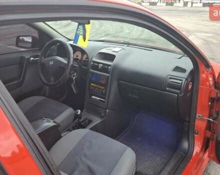 Красный Опель Астра, объемом двигателя 1.6 л и пробегом 220 тыс. км за 3300 $, фото 15 на Automoto.ua