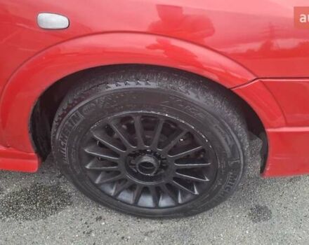 Красный Опель Астра, объемом двигателя 1.6 л и пробегом 220 тыс. км за 3300 $, фото 3 на Automoto.ua