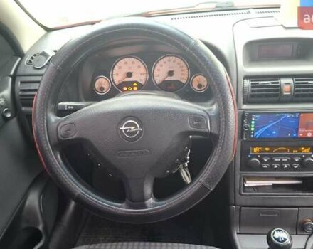 Красный Опель Астра, объемом двигателя 1.6 л и пробегом 220 тыс. км за 3300 $, фото 16 на Automoto.ua