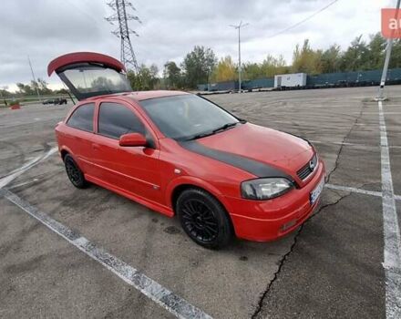 Красный Опель Астра, объемом двигателя 1.6 л и пробегом 220 тыс. км за 3300 $, фото 7 на Automoto.ua