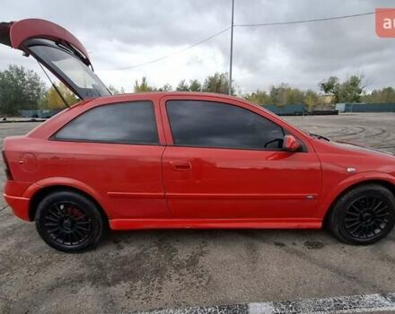 Красный Опель Астра, объемом двигателя 1.6 л и пробегом 220 тыс. км за 3300 $, фото 4 на Automoto.ua