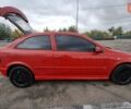 Красный Опель Астра, объемом двигателя 1.6 л и пробегом 220 тыс. км за 3300 $, фото 4 на Automoto.ua